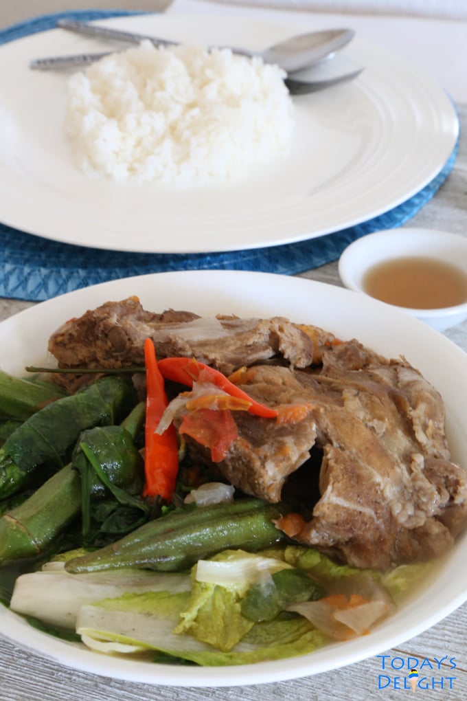Sinigang na Baboy sa Bayabas recipe is a Filipino soup with okra and other vegetables in a bowl.
