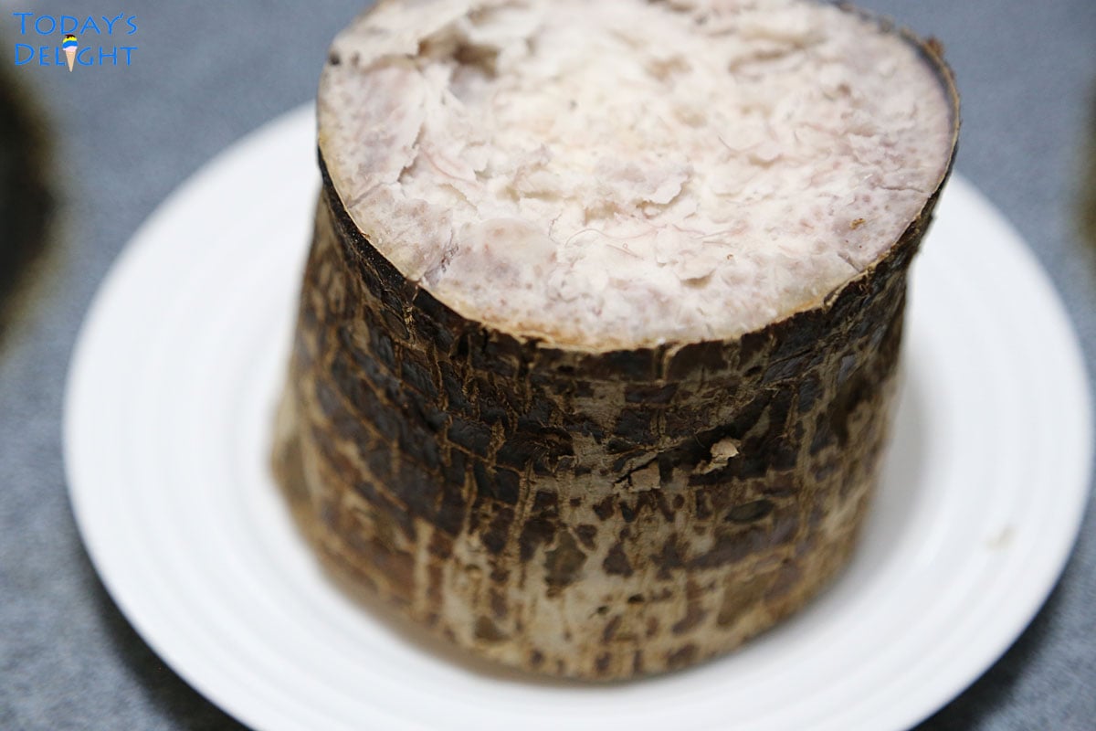 Cooked taro showing the inside. This is not the same as purple yam or ube.