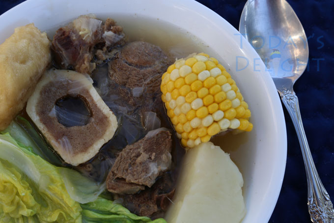 Bulalo in a bowl is a Filipino soup recipe made of beef shank, bone marrow, corn, potato, plantain banana and bok choy.