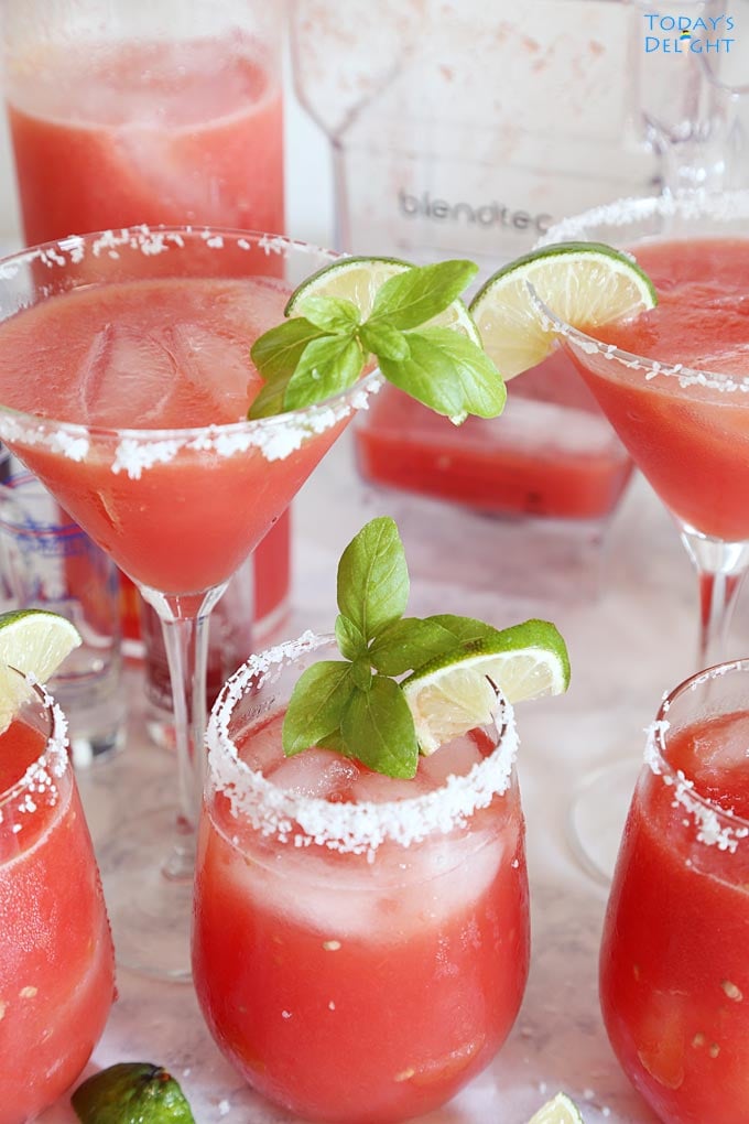 Glasses filled with watermelon juice.