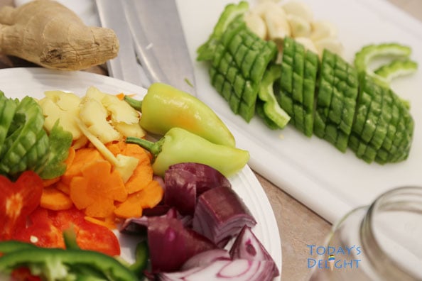 All the ingredients are prepared and chopped to make this pickled bitter gourd.