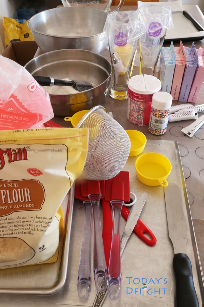 All the ingredients, equipment and cookwares to make macarons.