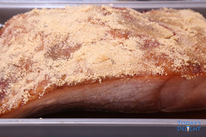 Brown sugar spread all over carver ham.