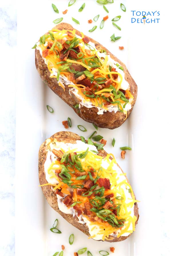 Russet potato baked in oven with topping is Today's Delight.