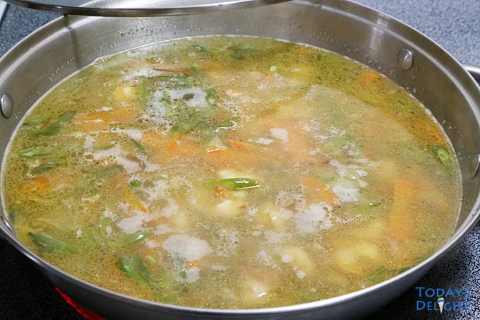 Shrimp stock is added to soften noodles.
