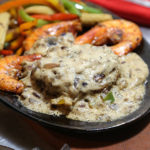 Rib Eye, Shrimp & sides in Mushroom Gravy
