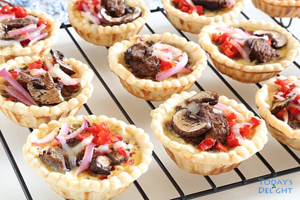 Mini Quiche with steak and vegetables in a rack