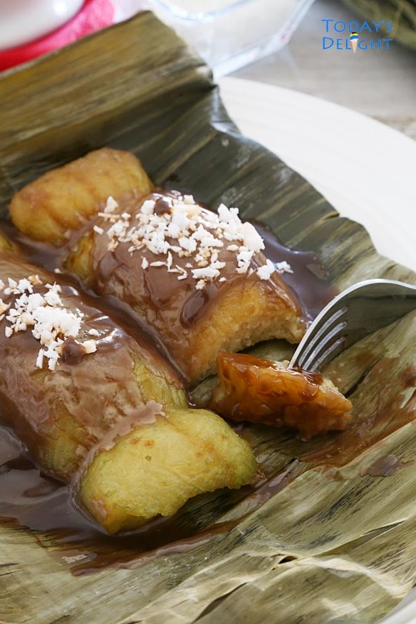 A Filipino sticky rice with coconut caramel sauce and grated coconut.