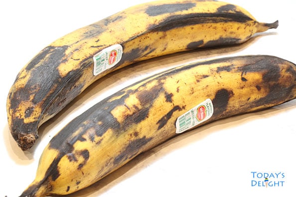 2 plantain banana with peel yellow and black