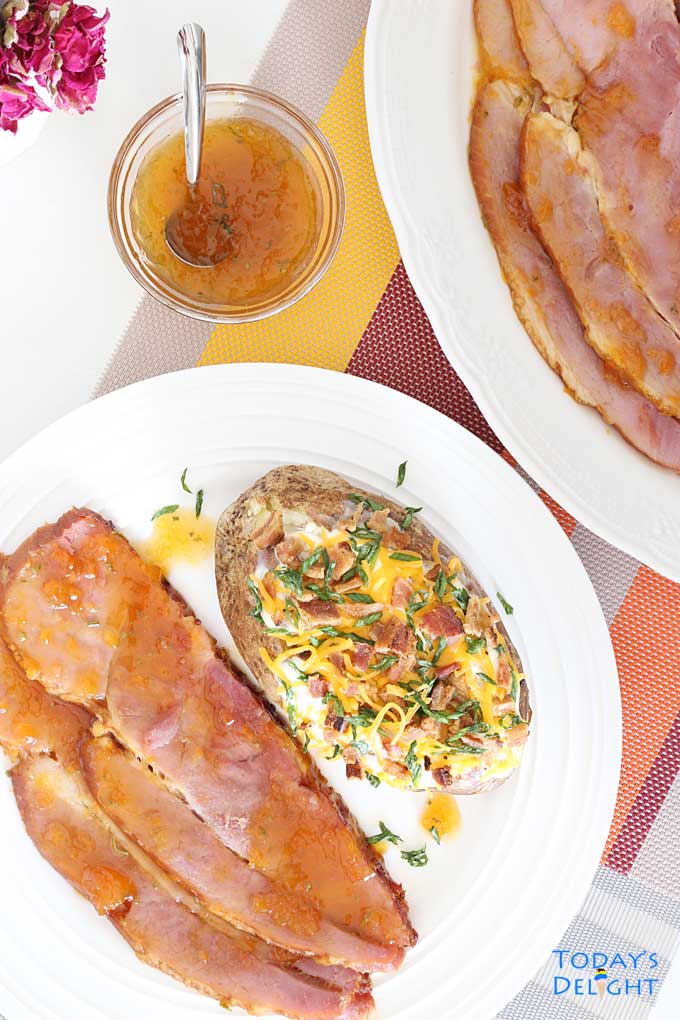 Apricot Glazed Ham with a side of baked potato