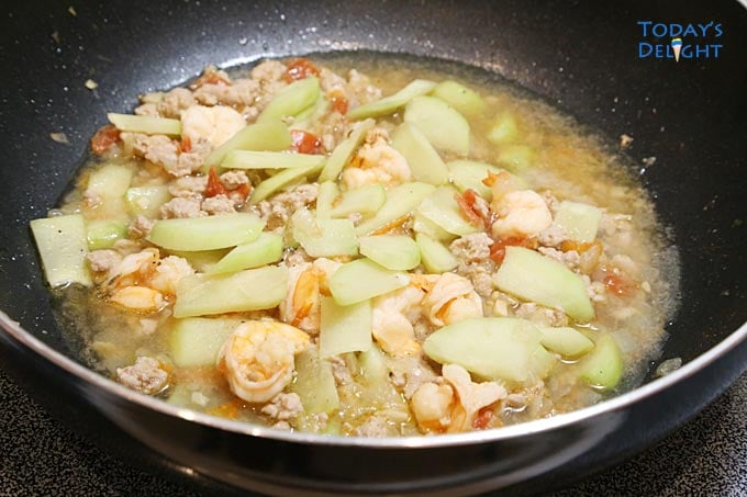 Sauteed Chayote with Pork and Shrimp in a skillet