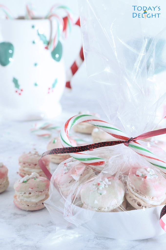 Give away Candy Cane Macarons with Buttercream Filling for the holiday.
