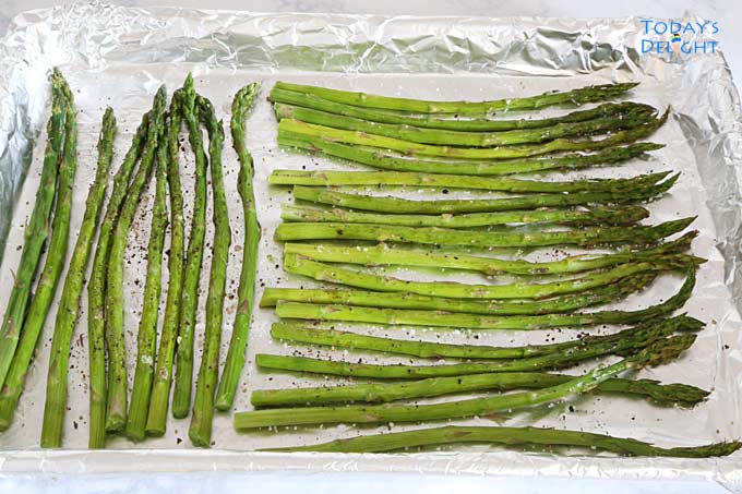 Coat asparagus with olive oil & season with salt and pepper.