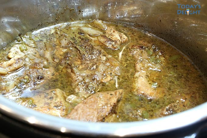 Pork Carnitas ingredients in Instant Pot.
