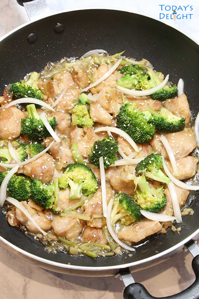 Chicken and Broccoli Stir Fry with Oyster Sauce in cooking pan.