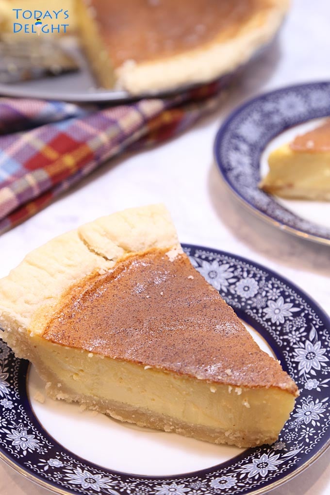 A slice of Eggnog Custard Pie on a plate is Today's Delight.