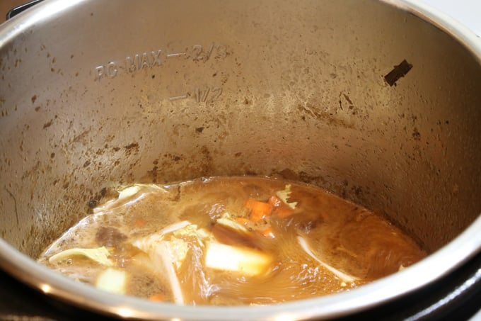 Cook vegetables in sauce.
