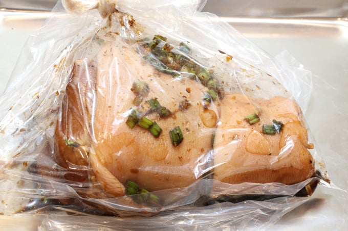 Marinated pork hock in plastic bag.