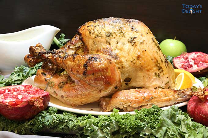 Roasted Turkey with Lemon Parsley & Garlic served during Thanksgiving & Christmas.