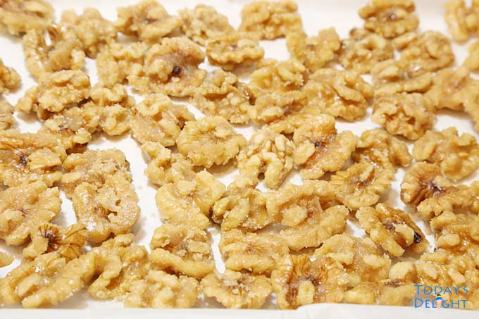 Candied walnuts with grainy texture.