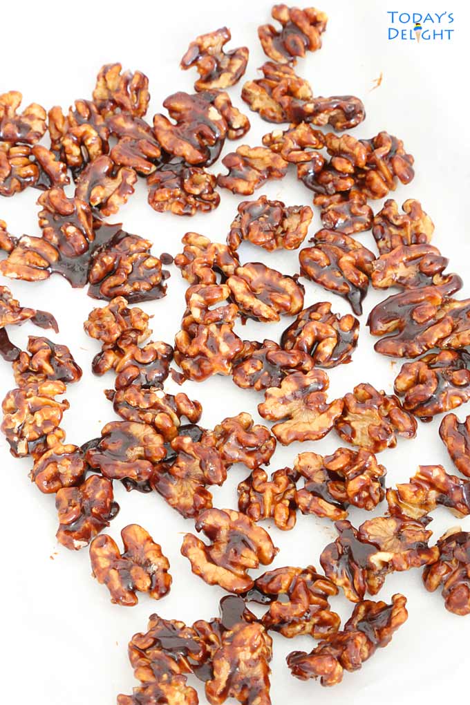Separated and well coated walnuts.
