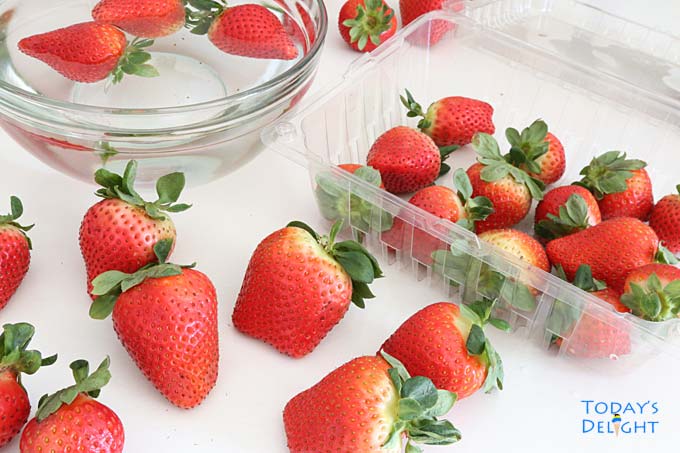 Picking & washing strawberries.