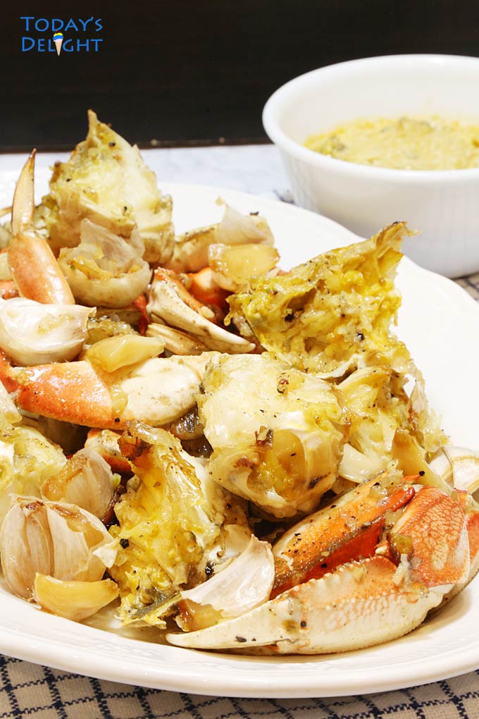 Garlic Butter Dungeness Crab with Crab butter on the side.