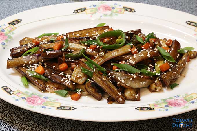 Pan Fried Eggplant with other veggies in savory sauce.