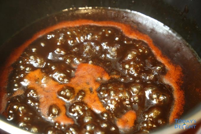 Thicken barbecue sauce mixture on stove top.