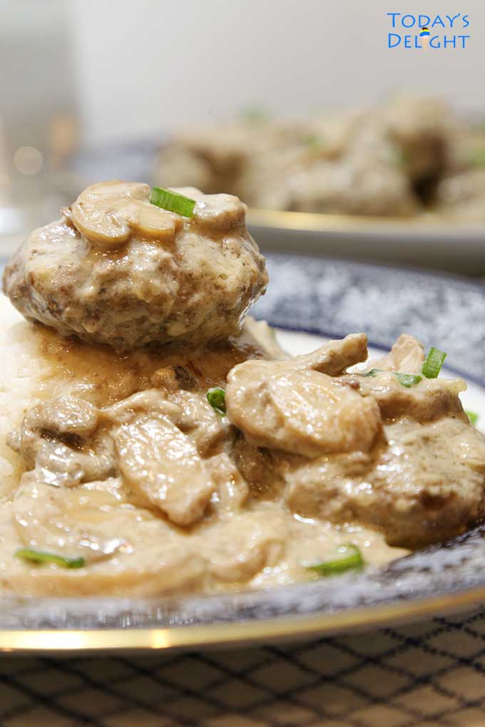 Burger Steak smothered with creamy Mushroom Gravy.