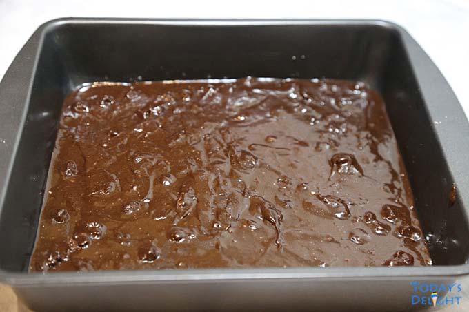 Unbaked brownie in 9x9 inch pan.