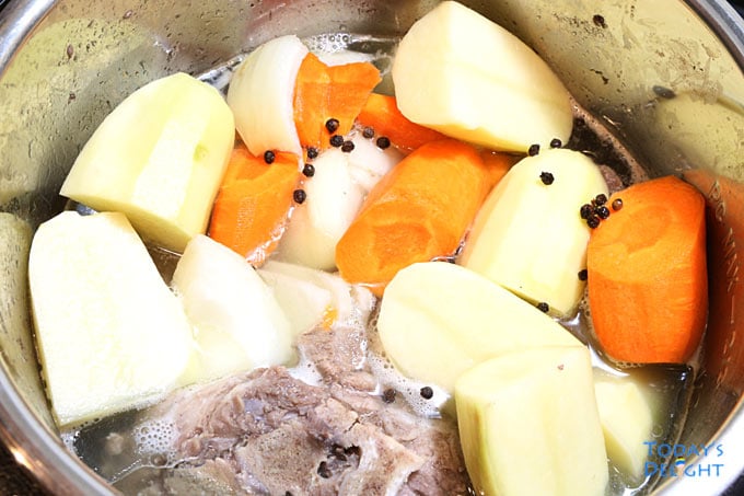 Pressure Cook pork and vegetables.