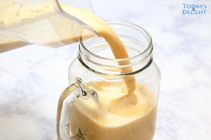 Orange Poppy Seed Dressing poured in mason jar.
