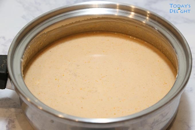 Ingredients to make peanut sauce in sauce pan.