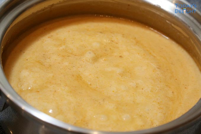 Simmered peanut sauce ingredients in a sauce pan.