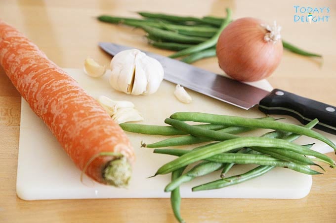 Carrots, green beans, garlic and onion.