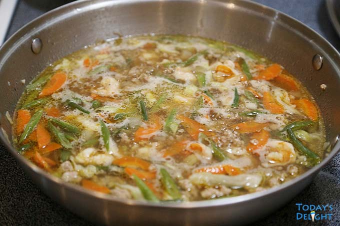 Vegetables are simmered in shrimp stock.