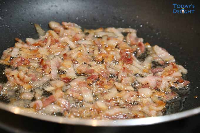 Bacon are sliced into smaller strips and fried until crisp then set aside.