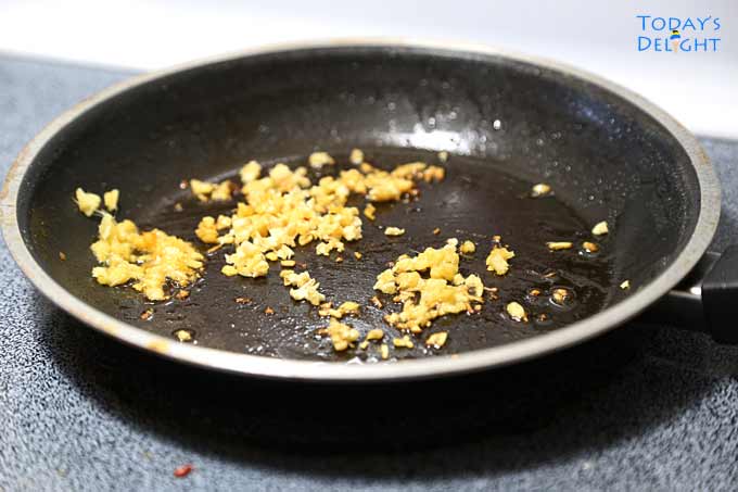 Saute ginger and garlic to make teriyaki sauce.
