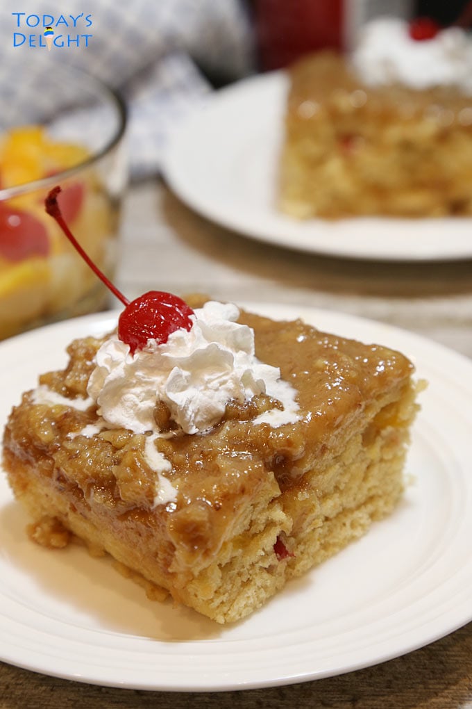 Plated warm cake with warm cake sauce.