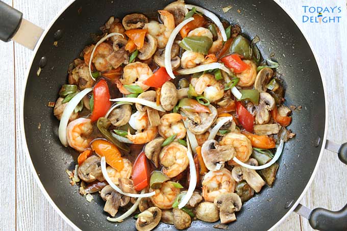 Shrimp and Mushroom Stir Fry in skillet.
