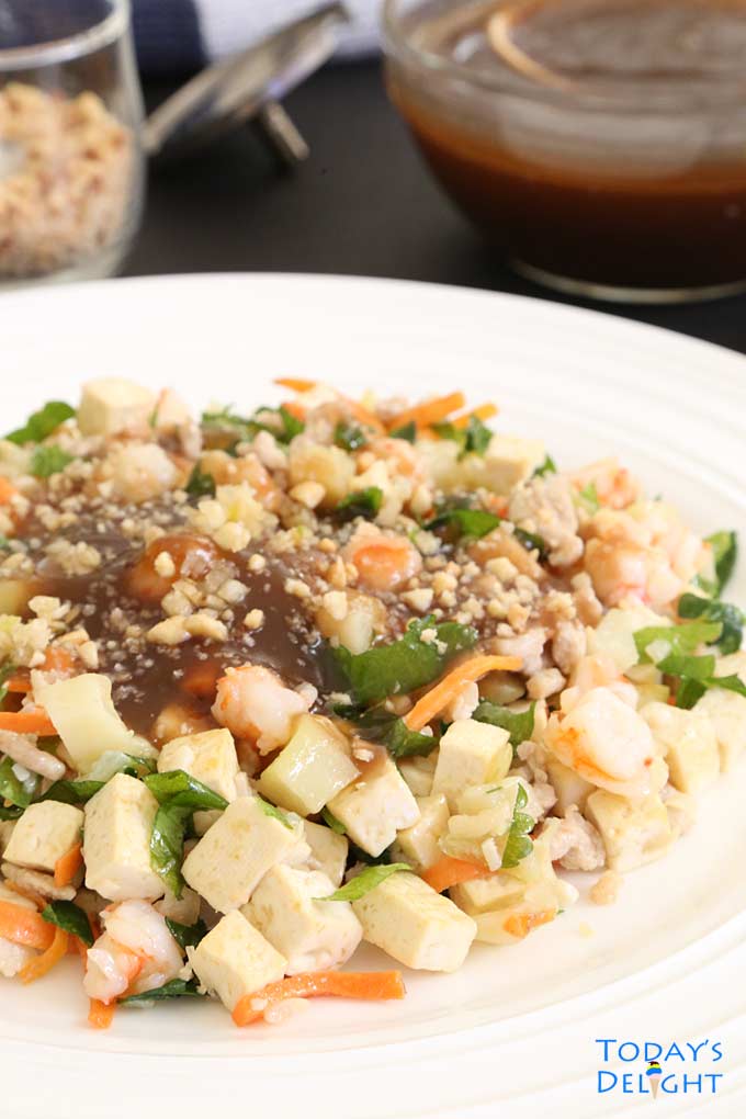 Drizzle brown sauce, garlic and peanuts over tofu veggie stir-fry.