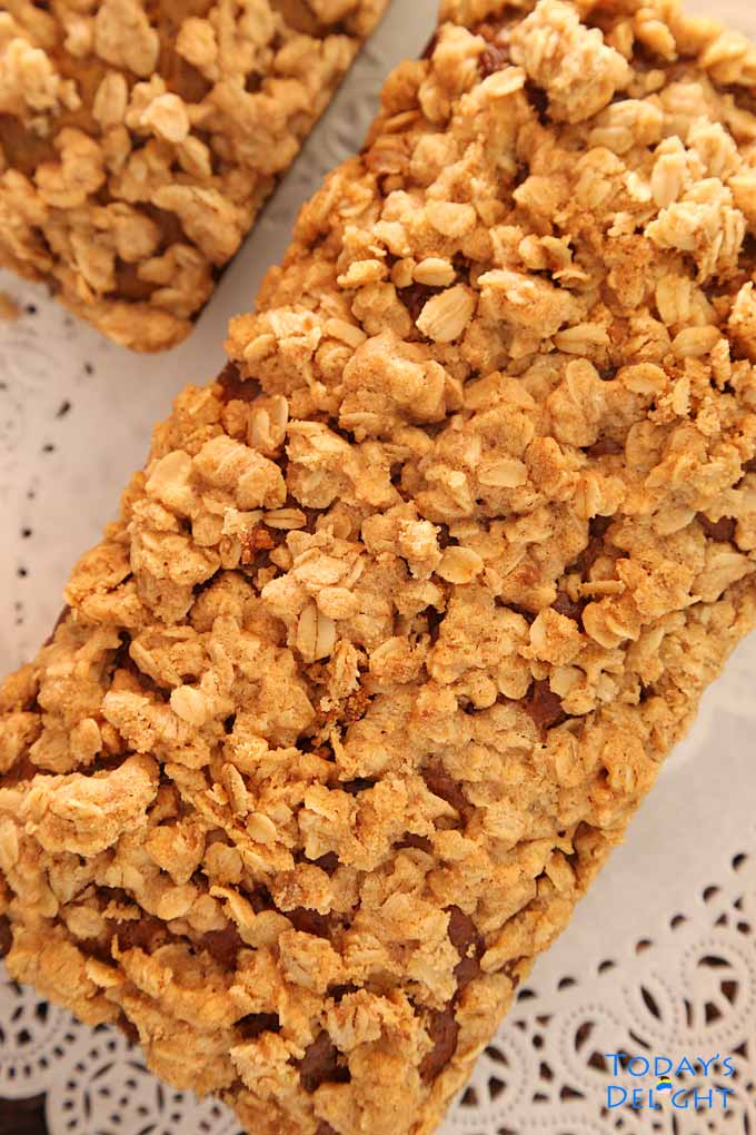 2 baked zucchini bread with crumb topping.