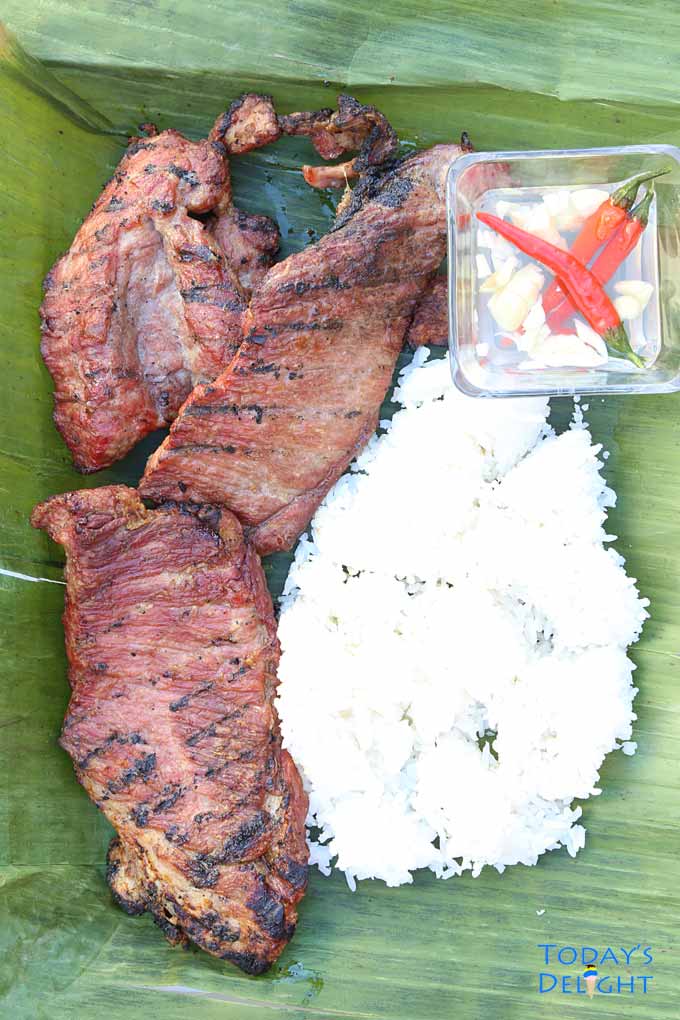 Grilled pork with rice and dip.