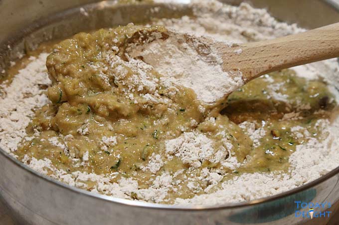Dry ingredients added to wet ingredients to make batter.