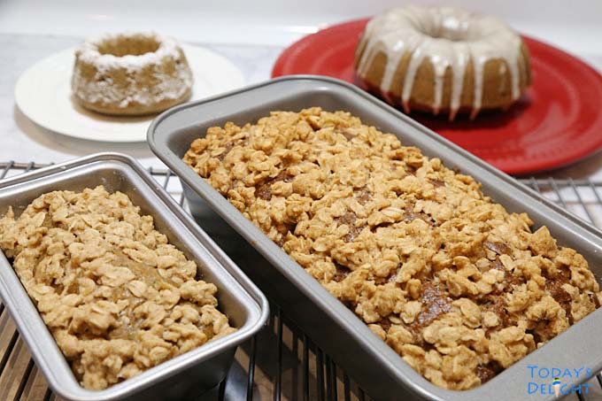 Baked zucchini bread with different toppings and sizes.