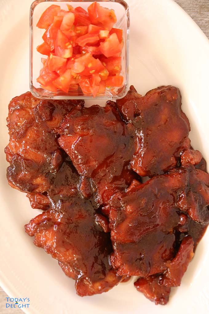 Cured meat Chicken Tocino with a side to cubed tomatoes is Today's Delight.