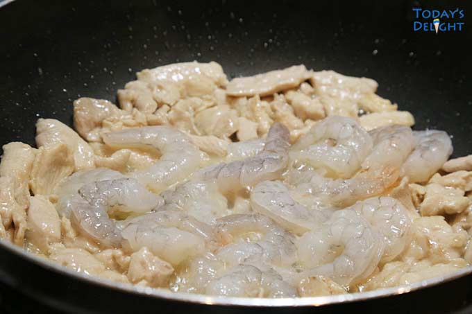 Shrimp added to skillet.