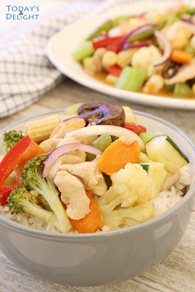 Bowl of rice with vegetable dish.