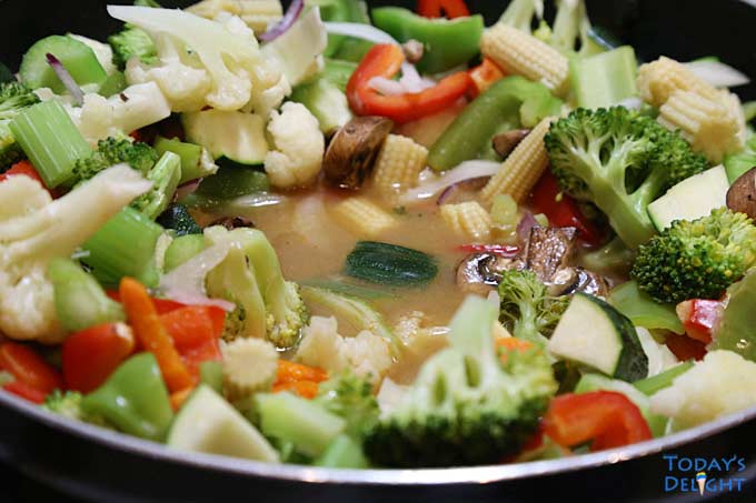 Chop Suey sauce is added to vegetable dish.